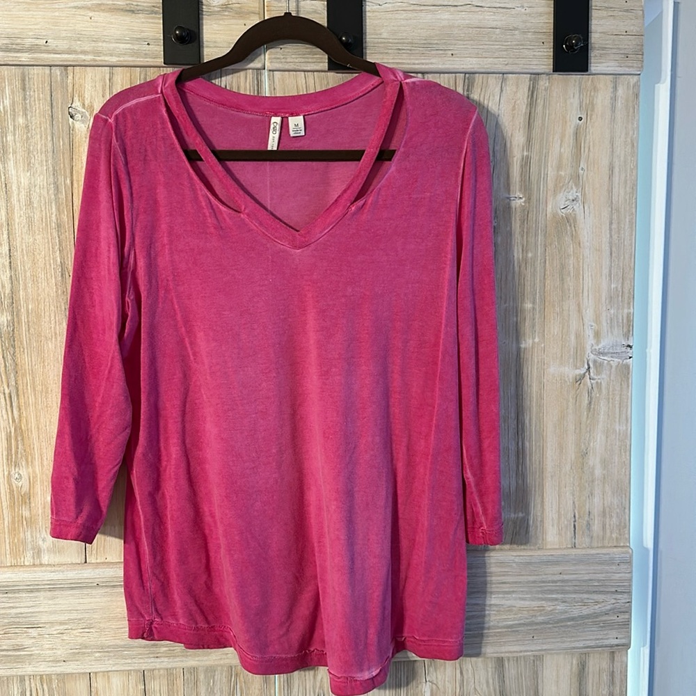 Distressed 3/4 length sleeve top. Size Medium